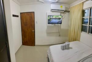 Postel nebo postele na pokoji v ubytování Hostal Viva Mar