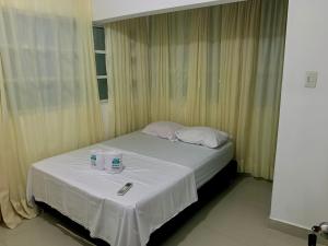 Postel nebo postele na pokoji v ubytování Hostal Viva Mar