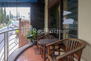 Μπαλκόνι ή βεράντα στο Hotel Sido Langgeng Tawangmangu Mitra RedDoorz