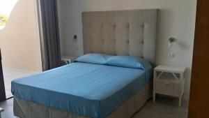 Postel nebo postele na pokoji v ubytování Moresco Resort