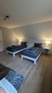 Ein Bett oder Betten in einem Zimmer der Unterkunft Ferienhaus Dhrontal