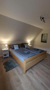 Ein Bett oder Betten in einem Zimmer der Unterkunft Ferienhaus Dhrontal