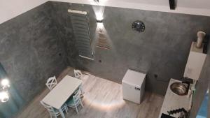 an overhead view of a kitchen with tables and chairs at Shahdag Mountain House in Qusar