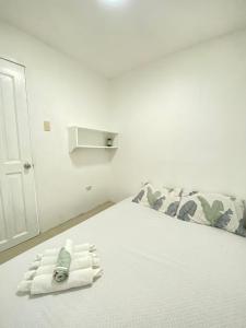 Ένα ή περισσότερα κρεβάτια σε δωμάτιο στο Casa Luna 2 Bedroom House