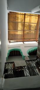 a view from the top of a room with a window at My house in Rabat