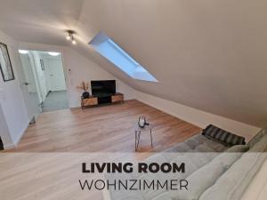 Μια τηλεόραση ή/και κέντρο ψυχαγωγίας στο Angel’s Sky Apartment Bühl