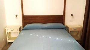 Postel nebo postele na pokoji v ubytování Moresco Resort