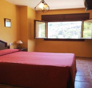 Posteľ alebo postele v izbe v ubytovaní Hotel Rural Pepe Alvarez