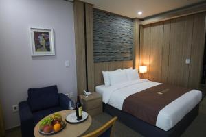 Postel nebo postele na pokoji v ubytování Benikea hotel seosan