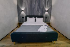 Posteľ alebo postele v izbe v ubytovaní Rado Hotel Spa