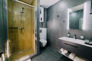 Kúpeľňa v ubytovaní Rado Hotel Spa