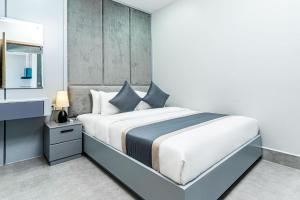 The Square Kampot Hotel客房内的一张或多张床位