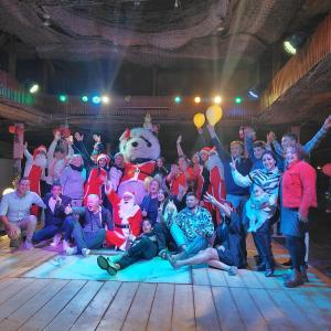 a group of people on the stage with santa claus at Happy Life Village Dahab in Dahab