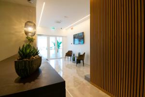 TV a/nebo společenská místnost v ubytování Residence Flow-R