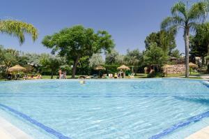 Piscina a Alfagar Village o a prop