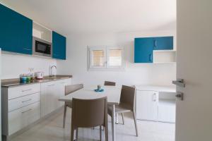 Kuchyň nebo kuchyňský kout v ubytování Residence Flow-R