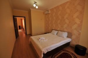 Кровать или кровати в номере Marani Hotel
