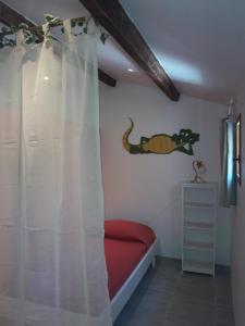 Postel nebo postele na pokoji v ubytování Le Clos des Dryades s