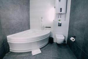 Kúpeľňa v ubytovaní Rado Hotel Spa