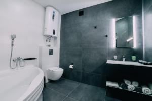 Kúpeľňa v ubytovaní Rado Hotel Spa
