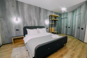 Posteľ alebo postele v izbe v ubytovaní Rado Hotel Spa