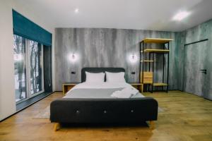 Posteľ alebo postele v izbe v ubytovaní Rado Hotel Spa