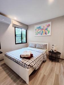 Postel nebo postele na pokoji v ubytování 2 Bedrooms Suite Pool Access@The Title Residencies Naiyang