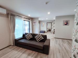 Posezení v ubytování 2 Bedrooms Suite Pool Access@The Title Residencies Naiyang