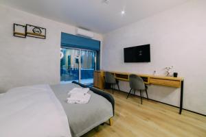 Posteľ alebo postele v izbe v ubytovaní Rado Hotel Spa