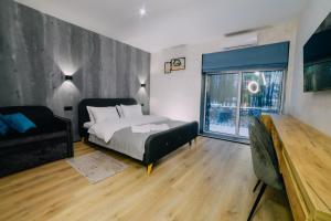 Posteľ alebo postele v izbe v ubytovaní Rado Hotel Spa