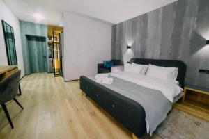 Posteľ alebo postele v izbe v ubytovaní Rado Hotel Spa