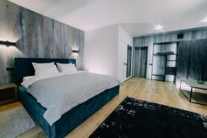 Posteľ alebo postele v izbe v ubytovaní Rado Hotel Spa