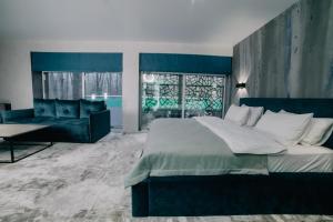 Posteľ alebo postele v izbe v ubytovaní Rado Hotel Spa