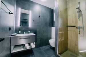 Kúpeľňa v ubytovaní Rado Hotel Spa