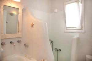 Koupelna v ubytování Altana Boutique Hotel