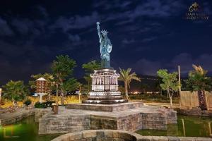 the statue of liberty at night at Danang Bay View Apartment - Phòng Code chủ in Danang