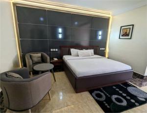 Ένα ή περισσότερα κρεβάτια σε δωμάτιο στο Newton Park Hotels Annex