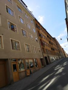 an empty street in front of a building at Stockholm City in Stockholm