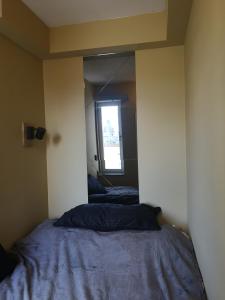 Giường trong phòng chung tại Stockholm City