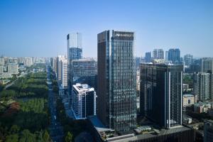 an aerial view of a city with tall buildings at JW Marriott Hotel Xi'an Southwest in Xi'an