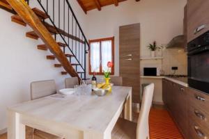 Kuchyň nebo kuchyňský kout v ubytování Casa Cao Appartamento Il Ginepro