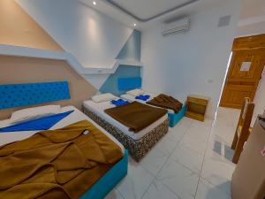 Voodi või voodid majutusasutuse Seaview Hotel Dahab toas