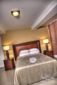 Postel nebo postele na pokoji v ubytování Siball Hotel