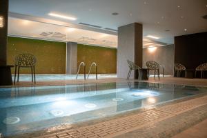 Bazén v ubytování RM Hotel Wellness & Congress nebo v jeho okolí