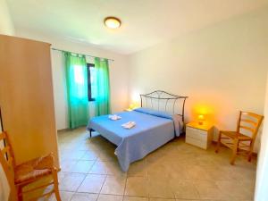 Postel nebo postele na pokoji v ubytování Residence Almusura