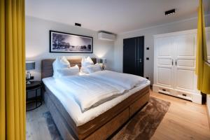 Voodi või voodid majutusasutuse Elbstrand Resort Krautsand - Hotel Elbstrand toas