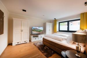 Voodi või voodid majutusasutuse Elbstrand Resort Krautsand - Hotel Elbstrand toas