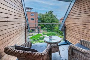 Rõdu või terrass majutusasutuses Elbstrand Resort Krautsand - Hotel Elbstrand