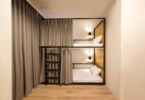 Voodi või voodid majutusasutuse Light Hostel - Tainan toas