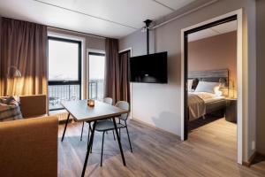Postel nebo postele na pokoji v ubytování Basecamp Narvik